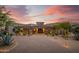 Stunning home featuring a grand entrance, stone accents, and desert landscaping at 7788 E Morning Vista Ln, Scottsdale, AZ 85266
