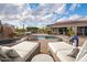 Tranquil poolside with lounge chairs, scenic views, and outdoor living areas at 7788 E Morning Vista Ln, Scottsdale, AZ 85266