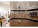 Beautiful shower featuring decorative tile accents and dispensers for bathing products at 7788 E Morning Vista Ln, Scottsdale, AZ 85266