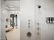 Modern bathroom with a rainfall shower and decorative stone feature adding to the luxurious ambiance at 7788 E Morning Vista Ln, Scottsdale, AZ 85266