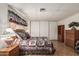 Comfortable bedroom with wood floor, bed, and matching furniture at 8323 E Deep Canyon Ct, Mesa, AZ 85208