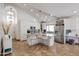 Bright kitchen with white cabinets, stainless appliances, and a center island with seating at 9015 E Altadena Ave, Scottsdale, AZ 85260