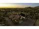 Expansive desert property featuring home with a tile roof, an outdoor deck, and captivating mountain views at 9690 W Martin Rd, Casa Grande, AZ 85194