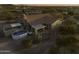 Lovely aerial view of backyard with above-ground pool, desert landscaping, and covered patio at 9690 W Martin Rd, Casa Grande, AZ 85194