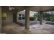 A serene covered back patio offering stunning views of the surrounding landscape at 9690 W Martin Rd, Casa Grande, AZ 85194