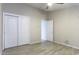 Bedroom with a closet, neutral walls, and tile floors, providing a comfortable retreat at 9690 W Martin Rd, Casa Grande, AZ 85194