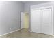 Bedroom featuring a closet, neutral walls, and tile floors, creating a serene and inviting space at 9690 W Martin Rd, Casa Grande, AZ 85194