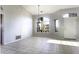 Dining room features tile floors and neutral paint with backyard view at 9690 W Martin Rd, Casa Grande, AZ 85194