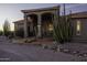 Desert home with desert landscaping at twilight at 9690 W Martin Rd, Casa Grande, AZ 85194
