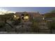 Inviting single-story home boasting a tiled roof and desert landscaping in a peaceful setting at 9690 W Martin Rd, Casa Grande, AZ 85194