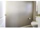 Clean, simple powder room with toilet and tile floor, conveniently located at 9690 W Martin Rd, Casa Grande, AZ 85194