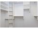 Spacious walk-in closet with built-in shelving, offering ample storage and organization at 9690 W Martin Rd, Casa Grande, AZ 85194