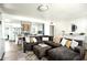 Open-concept living room featuring a modern kitchen and cozy seating area at 133 E Pierce St, Tempe, AZ 85288