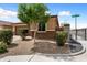 Charming single-Gathering home with low-maintenance landscaping, privacy wall, and gated entrance at 26242 N 122Nd Ln, Peoria, AZ 85383