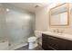Modern bathroom featuring glass shower, sleek vanity, and tiled floor at 7960 E Camelback Rd # 110, Scottsdale, AZ 85251