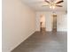 Bedroom featuring neutral walls, tile floors, and access to a closet at 7960 E Camelback Rd # 110, Scottsdale, AZ 85251