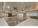 Community event hall with ceiling fans, tile flooring, and natural light for gatherings at 7960 E Camelback Rd # 110, Scottsdale, AZ 85251