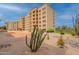 Exterior of condo building with cactus garden and desert landscaping at 7960 E Camelback Rd # 110, Scottsdale, AZ 85251