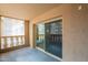 Spacious covered patio area with tiled flooring and sliding glass door at 7960 E Camelback Rd # 110, Scottsdale, AZ 85251