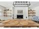 Cozy dining room with rustic decor, a fireplace, and decorative shelving at 10832 N 37Th St, Phoenix, AZ 85028