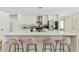 Bright, renovated kitchen with stainless appliances, bar seating at the island, and modern finishes at 10832 N 37Th St, Phoenix, AZ 85028