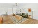 Spacious living room with stylish decor, wood floors, and an inviting atmosphere at 10832 N 37Th St, Phoenix, AZ 85028
