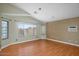 Spacious room featuring hardwood floors and several windows for ample natural light at 1123 N Agave St, Casa Grande, AZ 85122
