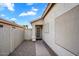 Front door framed by a covered porch offering privacy and protection from the elements at 1123 N Agave St, Casa Grande, AZ 85122