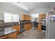 Well-maintained kitchen featuring modern appliances, ample counter space and tile backsplash at 1123 N Agave St, Casa Grande, AZ 85122
