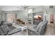 Comfortable living room featuring neutral colors, recessed lighting, and sliding door access at 1123 N Agave St, Casa Grande, AZ 85122