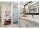 Updated bathroom with white vanity, tiled shower, and decorative accents, offering a spa-like experience at 11416 N Blackheath Rd, Scottsdale, AZ 85254