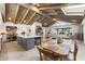 Bright, open kitchen with vaulted ceilings, center island, and seamless flow into the living area at 11416 N Blackheath Rd, Scottsdale, AZ 85254