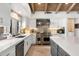 Gourmet kitchen features an island, stainless steel appliances, and subway tile backsplash at 11416 N Blackheath Rd, Scottsdale, AZ 85254