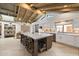 Eat-in kitchen boasting vaulted ceilings, stainless steel appliances, and an expansive center island at 11416 N Blackheath Rd, Scottsdale, AZ 85254