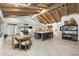 Spacious kitchen and dining area with high vaulted ceilings and a large center island at 11416 N Blackheath Rd, Scottsdale, AZ 85254