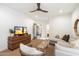Inviting living room with comfortable seating and a media center, perfect for relaxation at 11416 N Blackheath Rd, Scottsdale, AZ 85254