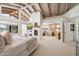 Bright main bedroom featuring a fireplace, high ceilings, and large windows with golf course views at 11416 N Blackheath Rd, Scottsdale, AZ 85254