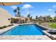 Stunning pool with a spacious deck, perfect for entertaining and enjoying the outdoors at 11416 N Blackheath Rd, Scottsdale, AZ 85254