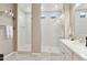 Contemporary bathroom featuring dual walk-in showers with sleek fixtures and modern tile work at 11609 W Andrew Ln, Peoria, AZ 85383