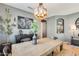 Comfortable dining room with natural light, stylish decor, and an open layout at 11988 W Nadine Way, Peoria, AZ 85383
