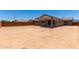 The home has a large, unfinished backyard and a covered patio at 12366 W Marguerite Ave, Avondale, AZ 85323