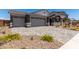 Beautiful home with a paved driveway and a three car garage at 12366 W Marguerite Ave, Avondale, AZ 85323