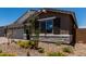 Close-up of charming home with beautiful landscaping and stone accents at 12366 W Marguerite Ave, Avondale, AZ 85323