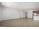 Open-concept living space with sleek tile flooring, and ample natural light at 12366 W Marguerite Ave, Avondale, AZ 85323