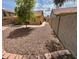 Low-maintenance backyard featuring desert landscaping and a block fence for privacy at 1314 W Kingbird Dr, Chandler, AZ 85286