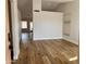 Open-concept living room features wood floors and neutral walls for versatile decorating at 1314 W Kingbird Dr, Chandler, AZ 85286