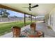 Backyard patio with ceiling fan and decorative chairs at 13419 N 35Th St, Phoenix, AZ 85032
