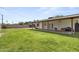 Large grassy backyard with covered patio at 13419 N 35Th St, Phoenix, AZ 85032