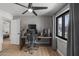 Comfortable office area with a large desk, modern lighting, and neutral decor, creating an ideal workspace at 13419 N 35Th St, Phoenix, AZ 85032