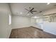 Spacious living area with hardwood floors, vaulted ceilings and open layout, perfect for modern living and entertaining at 1357 S Loma Vis, Mesa, AZ 85204